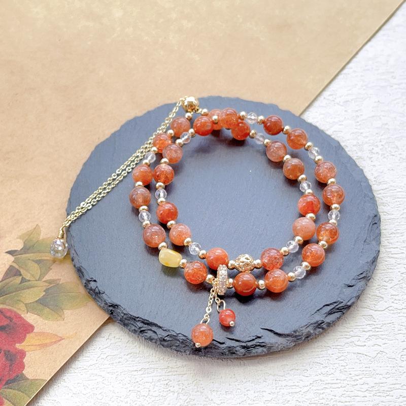 

Bracelet orange red cat s eye gold sand crystal double circle bracelet sunstone women s gold strawberry crystal