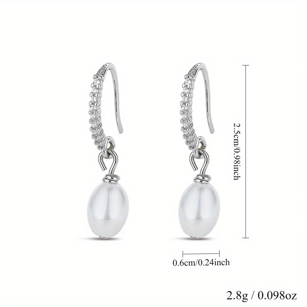 Ohrringe mit weißem Zirkonia und Perlenimitat