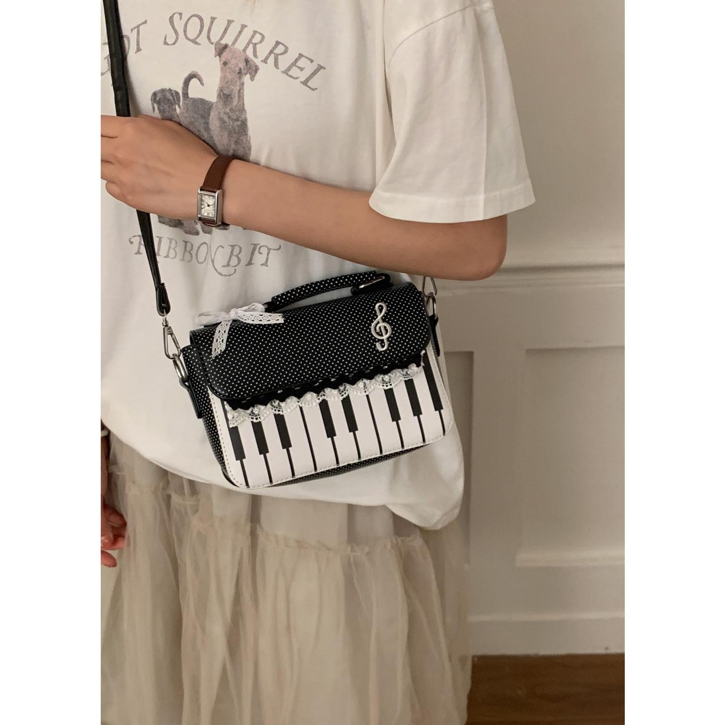 

Korean version of fashion portable literary piano bag women s 2025 new fashion niche small square bag shoulder messenger bag