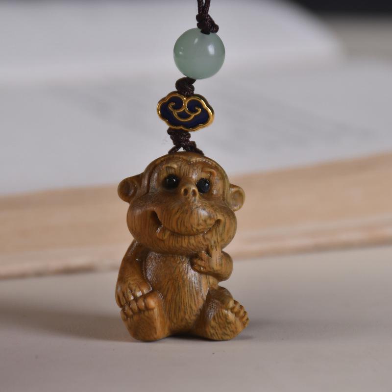 Twelve Zodiac Animal Charms Green Sandalwood Set: Rat, Ox, Tiger, Rabbit, Dragon, Snake, Horse, Sheep, Monkey, Rooster, Dog, Pig.