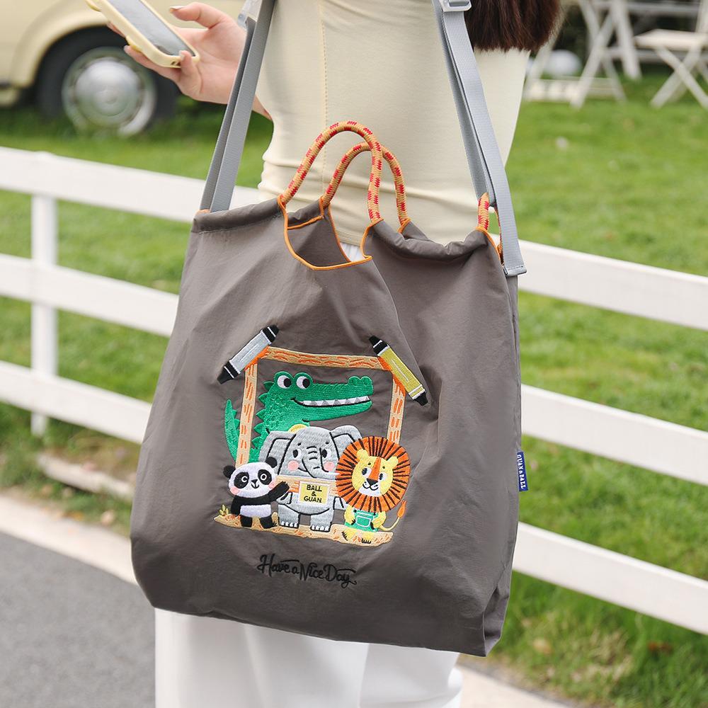 Versatile Cartoon Canvas Bag: Cute Waterproof Tote, Shoulder, and Crossbody Bag for Shopping and Going Out. Eco-Friendly.