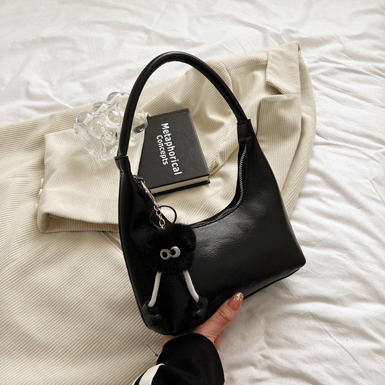 

High-end fashion versatile bag women s 2024 new niche design casual shoulder bag solid color baguette armpit bag 22*5*10