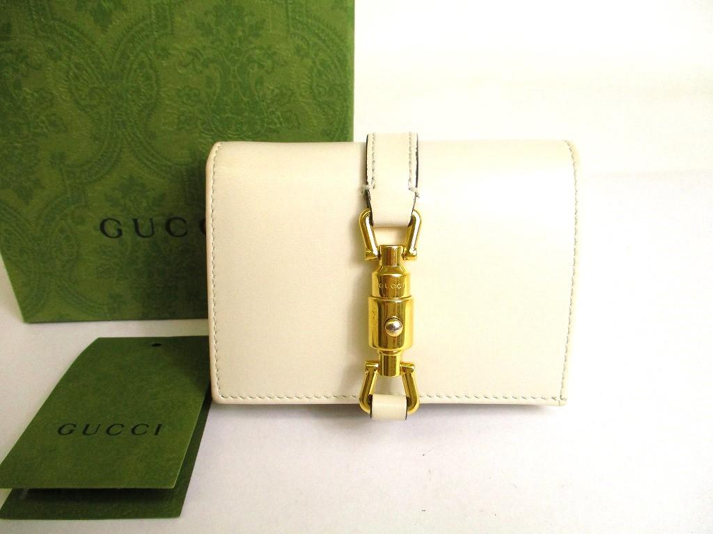 

Автентичний GUCCI Jackie 1961, білий шкіряний портативний футляр, компактний гаманець №9859, відремонтований
