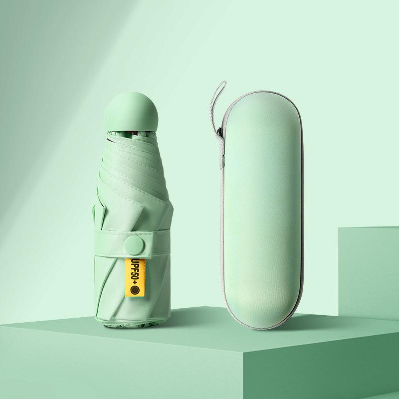 50 % rabatt på svart kapselparaply i lommeformat - Seks-skjerms sammenleggbar for sol og regn