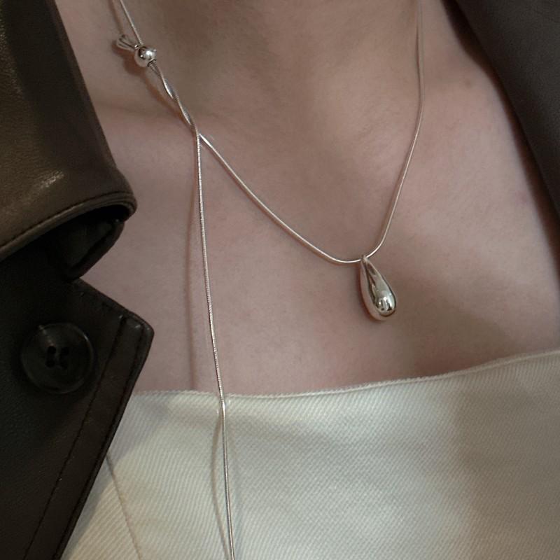 Elegant Pull-Out Water Drop Necklace for Women - Fashionable, Versatile, and Simple Luxury Sweater Chain