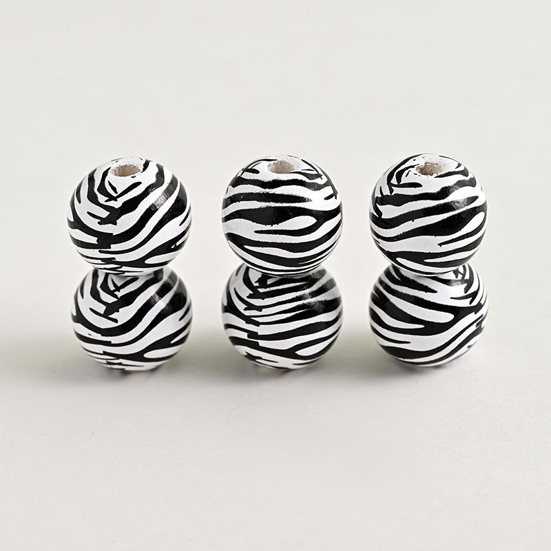 

Деревянные бусины с принтом животных Леопардовый принт Деревянные россыпные бусины Узор зебры Круглые бусины Сделай сам Плетеные деревянные бусины с бахромой на пеньковой веревке 16mm