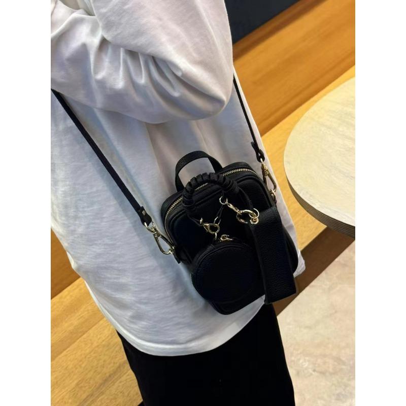 Spring and summer new women's bags niche design change mobile phone bag fashion versatile mini bag cowhide messenger bag