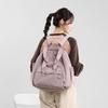 Schoolbag Japanese backpack Large capacity backpack Women's waterproof multi-functional versatile shoulder bag Tote bag Student travel commute