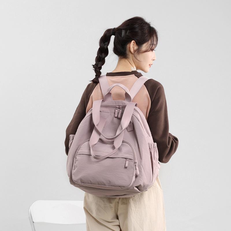 Schoolbag Japanese backpack Large capacity backpack Women's waterproof multi-functional versatile shoulder bag Tote bag Student travel commute