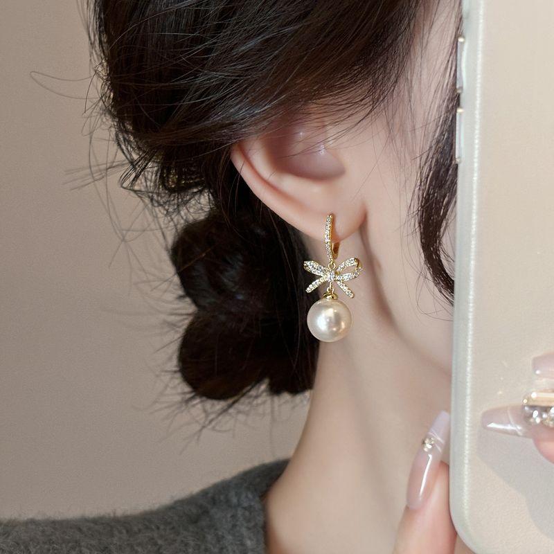 

Accessible Luxury Pearl Female Best Selling Niche Ear Jewelry Bows Bows pendant earrings [gift exquisite gift box]]