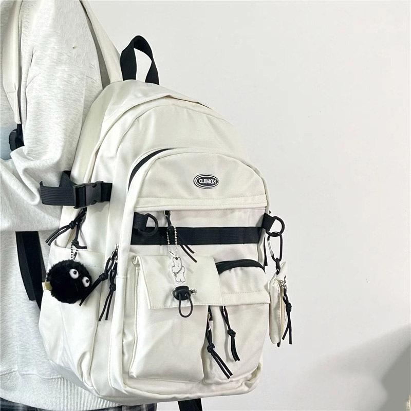 Korean version of versatile tooling style schoolbag female student large capacity Japanese bag travel backpack men and women backpack