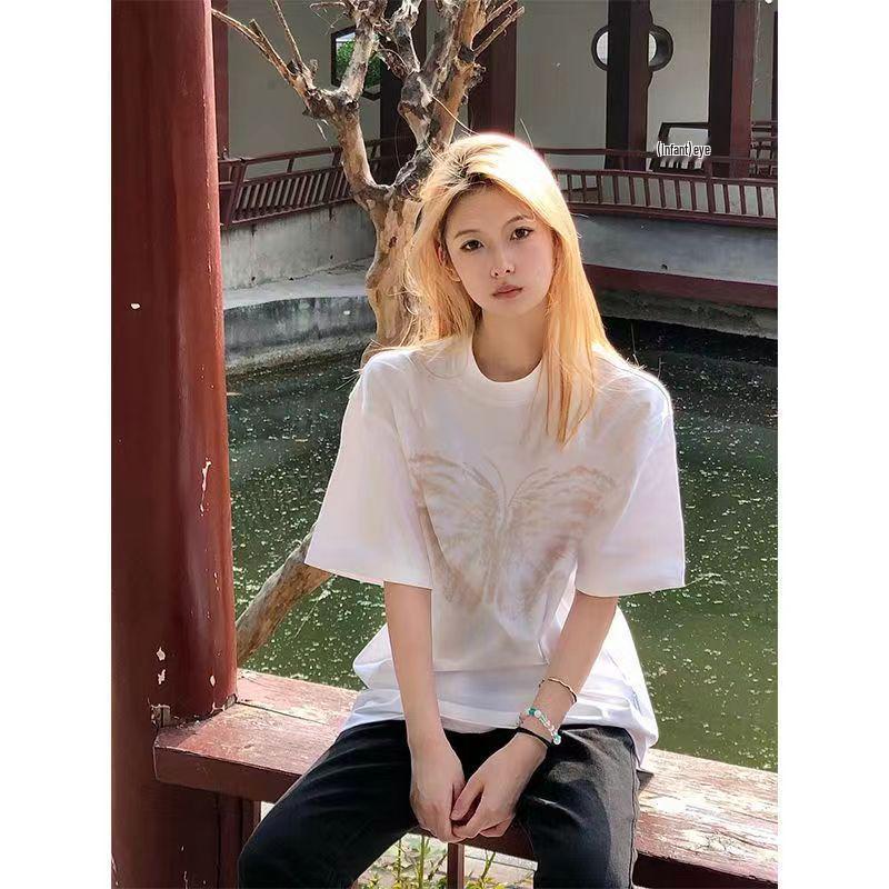 

2024 Европейский стиль Женская повседневная футболка свободного кроя средней длины с круглым вырезом и короткими рукавами Large белый