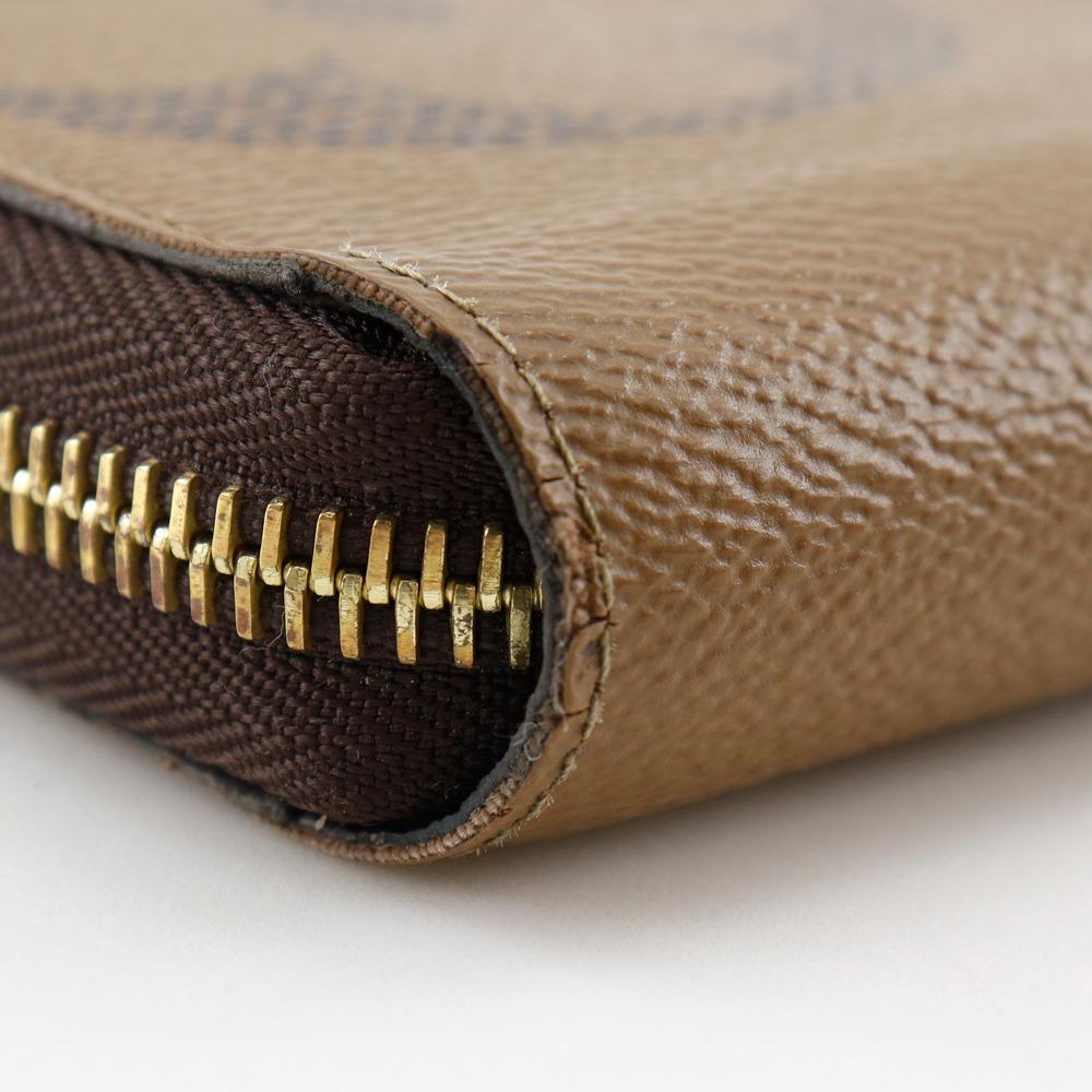 LOUIS VUITTON Zippy wallet Purse M69353 Monogram Giant Reverse Brown Monogram canvas unisex Used