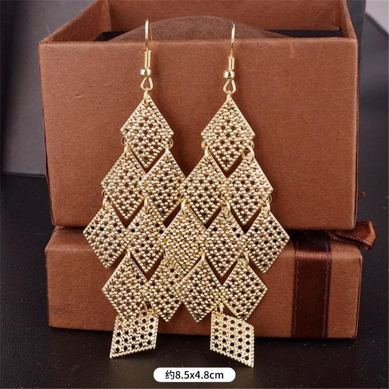 Fashion exaggerated niche temperament fringed earrings retro personality versatile sequined earrings women's long ear jewelry