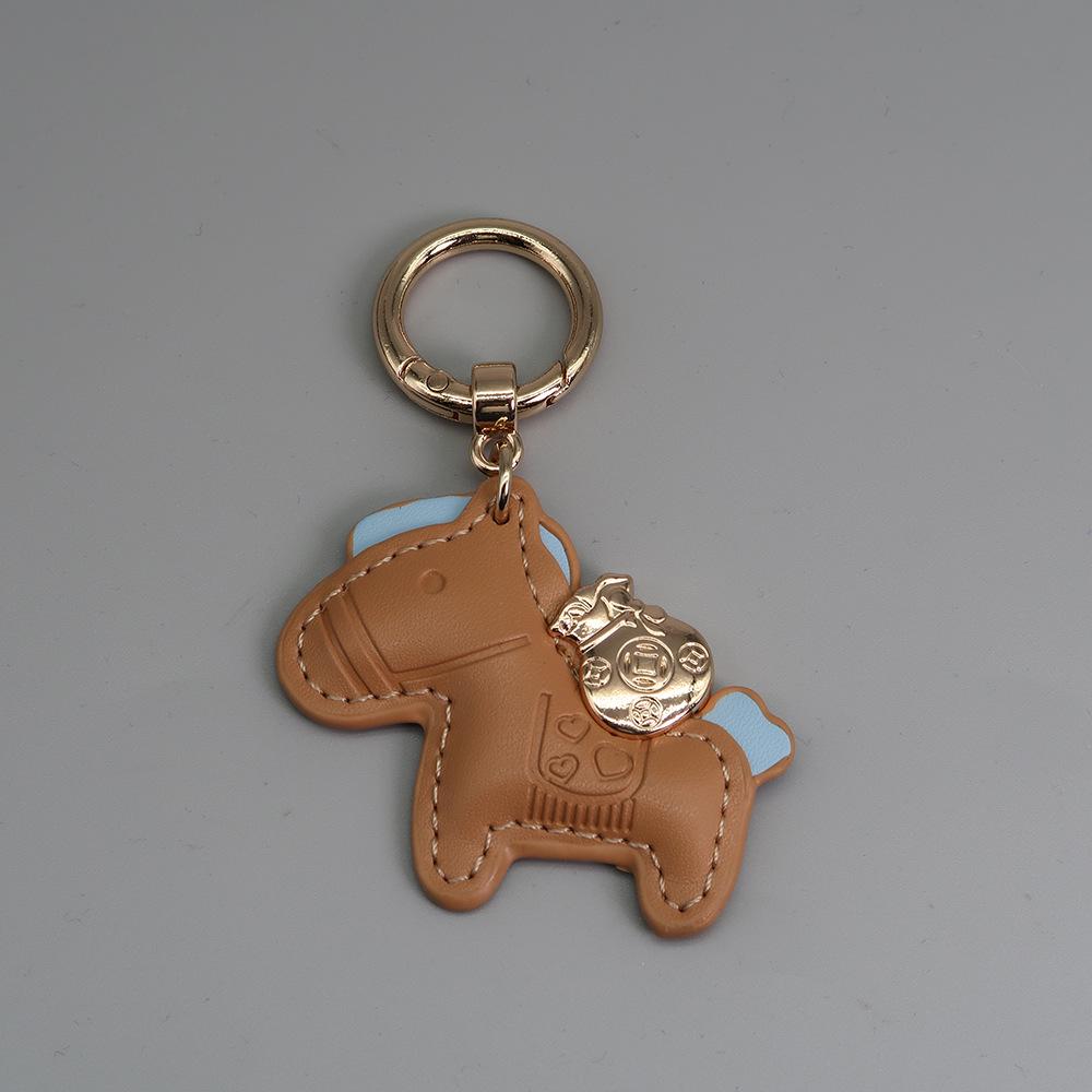 Instant Wealth Leather Keychain with Cartoon Pony Pendant for Couples – Trendy Bag and Car Accessory