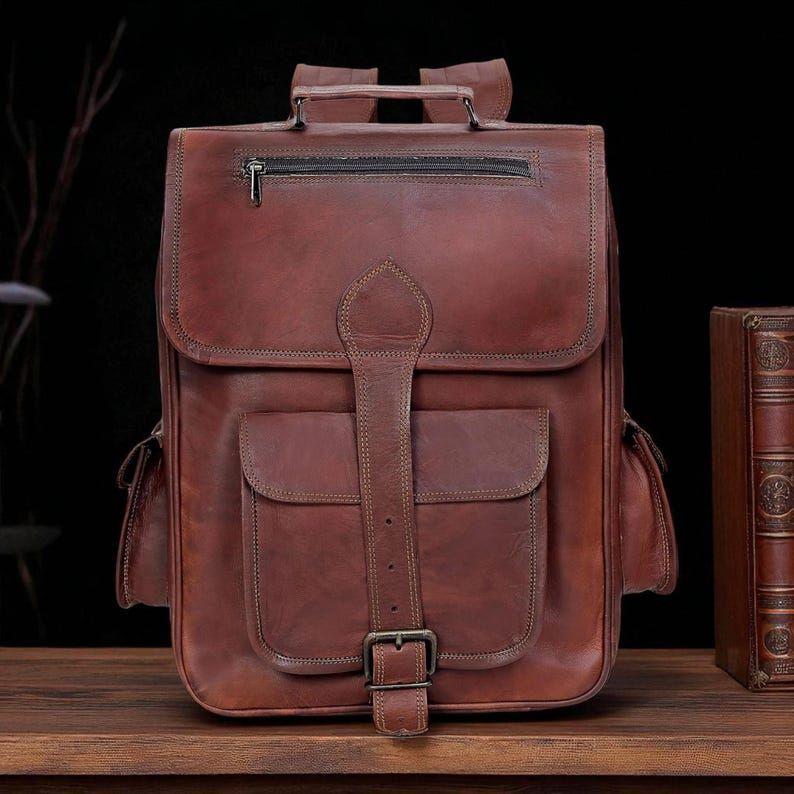 

Большой кожаный рюкзак ручной работы – Винтажная дорожная сумка из кожи буйвола полной зернистости с парусиновой подкладкой, латунными пряжками 16 x 12 x 5 in