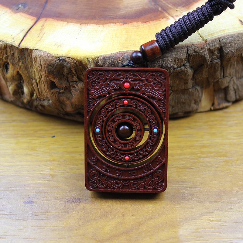 Lucky Jujube Wood Keychain: Double-Sided Exquisite Carving with Rotating Handpiece for Good Fortune.