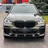 BMW X5 G05 Carbon Fiber Diffuser Kit: Front & Rear with Center Wing, Top Wing, Spoiler, and Rear Wing.