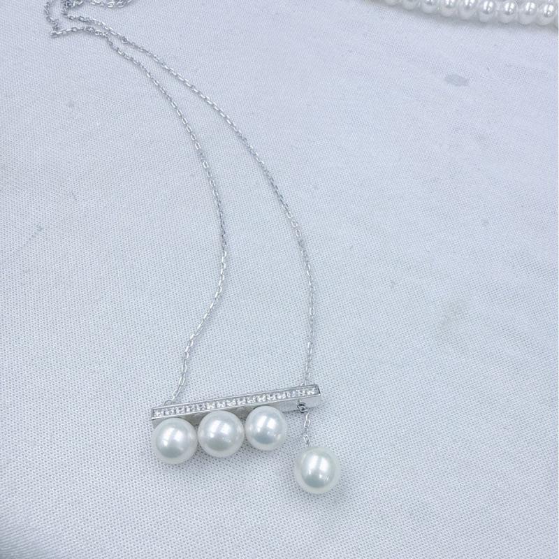 

Aurora Flawless 7.5-8mm Round Pearl Necklace with Sterling Silver & Wood Pull-out Pendant