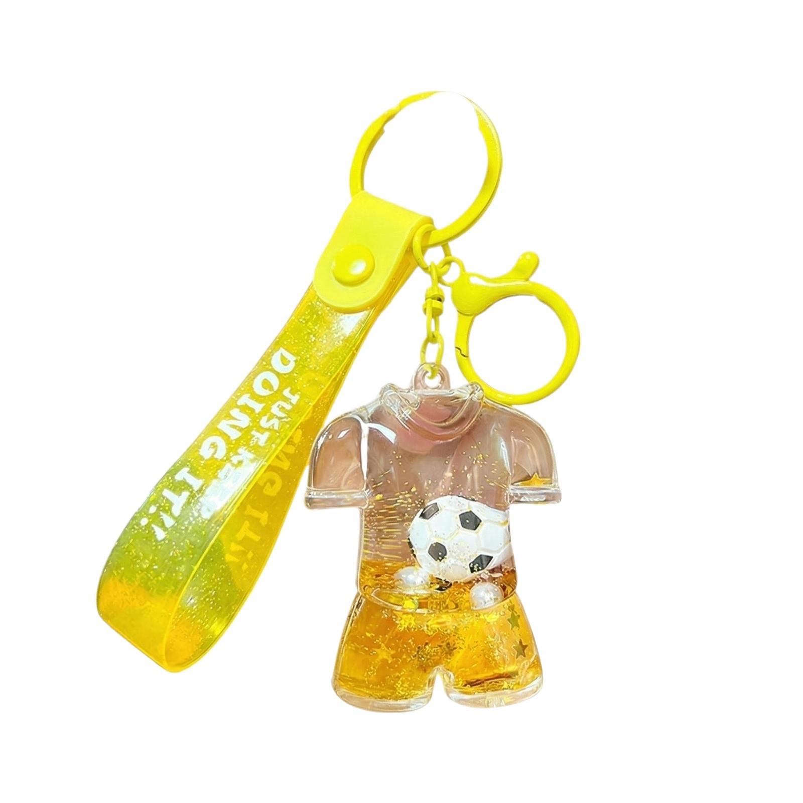 

Soccer Uniform Shaped Keychain with Wrist Strap and Miniature Ball Design for Bags Backpacks Keys Accessories One Size жовтий