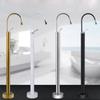 Tuqiu Black Bathroom basin Faucet Brass Floor Standing Bathtub Faucet Sink Mixer Tap super long water drop design gold sink tap