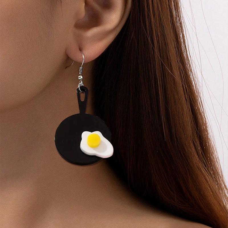 Pair of black pan fried eggs earrings earrings cartoon creative plane cute and sweet