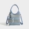New color blocking woven handbag with female niche design, fashionable mobile phone bag, versatile hollow shoulder bag