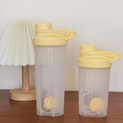Kompakt gul proteinshakerkopp med skala - PP-plast miksekopp for måltidserstatning og treningsdrikker