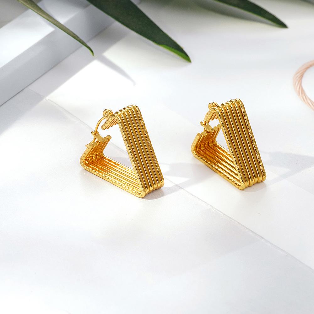 IMI Titanium Steel Twisted Line Hoop Earrings - Light Luxury Geometric Design