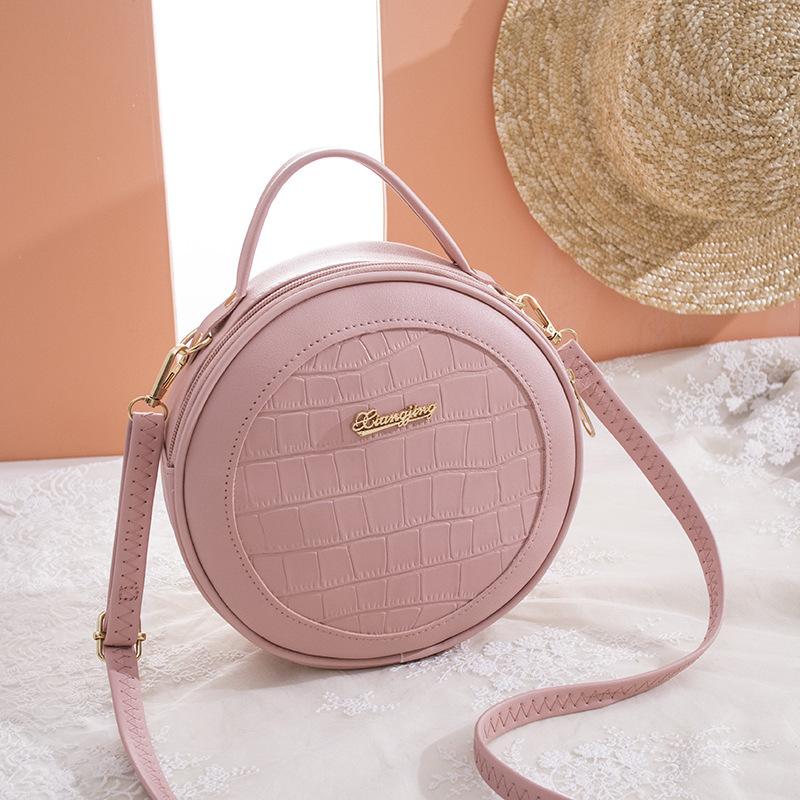 

Women s bag summer and autumn new trendy crocodile pattern small round bag single shoulder oblique span portable women s bag розовый