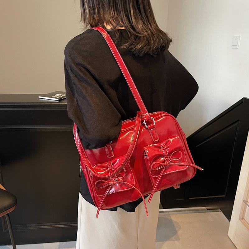 Europäische und amerikanische Retro-Tragetasche mit großer Kapazität und Schleife, Damen Herbst und Winter, neuer vielseitiger Rucksack, Schultertasche, Boston Bag