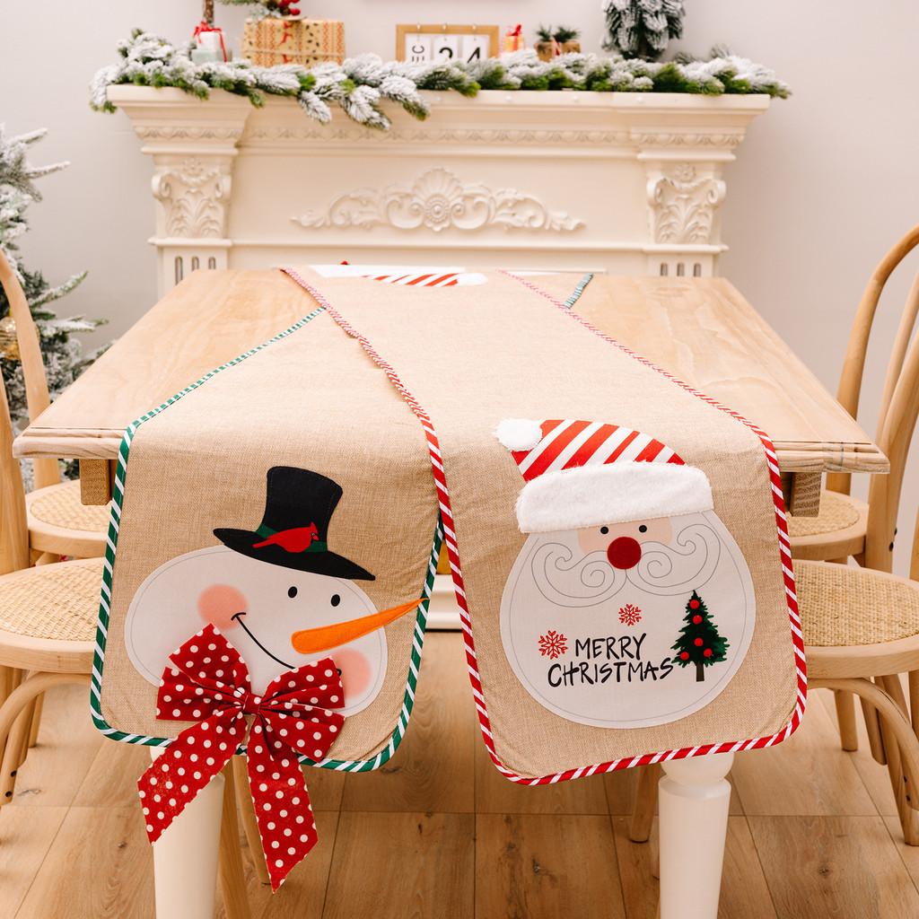 Charming Burlap Christmas Table Decor With Striped Edges Adorned With Whimsical Snowman And Characters Santa