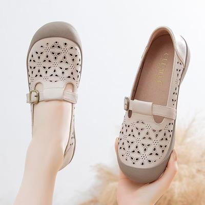 Sommer neue runde Zehenpartie hohle atmungsaktive Lochschuhe weiches Leder Muffinsohle bequeme Schuhe Sandalen Damen