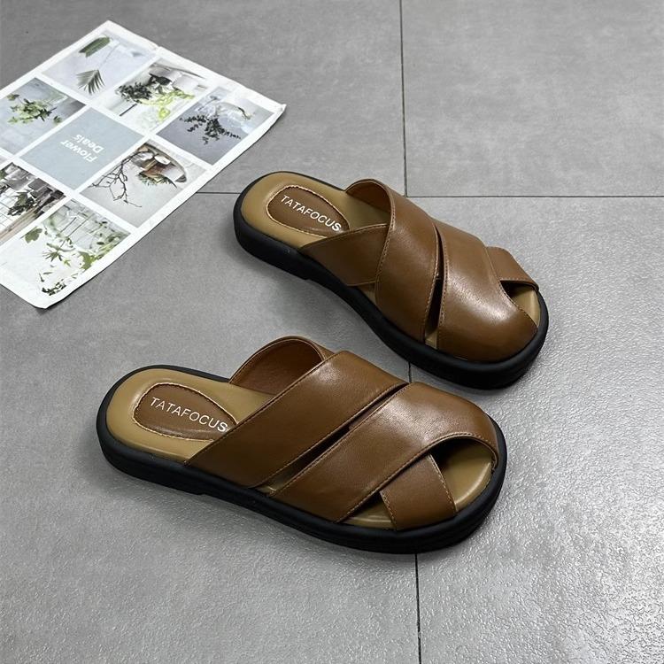 Leather bag head slippers women's outer wear 2025 spring and summer new retro woven hollow one pedal lazy drag