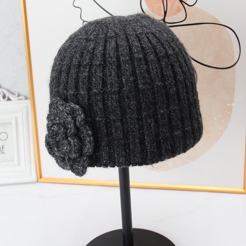 Three-dimensional flower knitted headgear women's autumn and winter face small warm windproof cold hat ear protector wool hat pullover hat