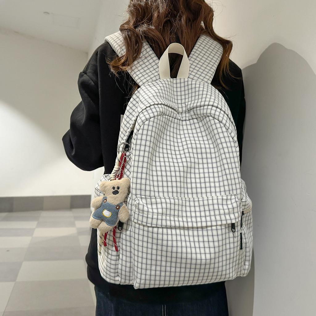Schultasche Retro Hongkong-Stil karierter Rucksack Damen 1011 neu große Kapazität Mittelschule College-Student Schultasche Reise-Computerrucksack