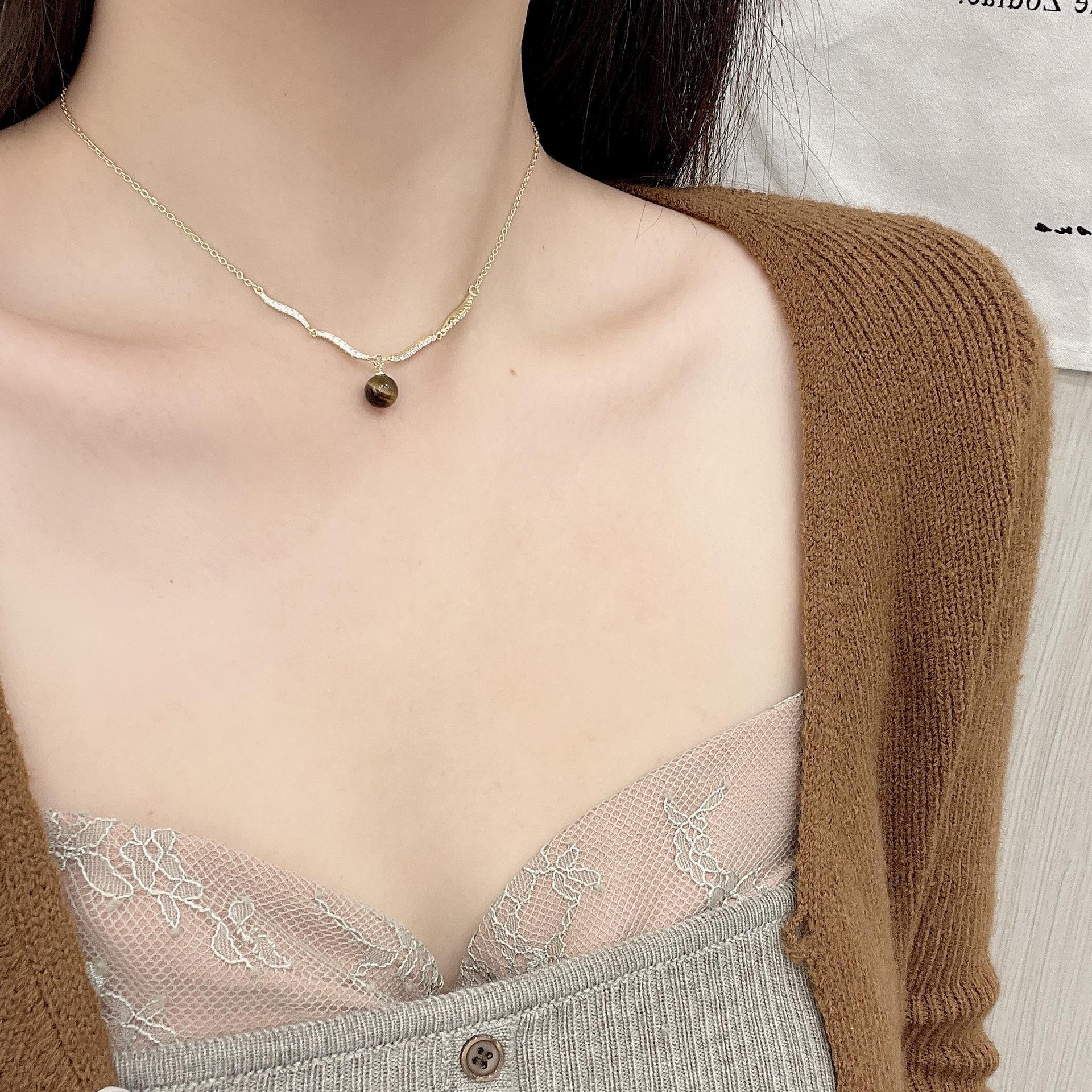 

Elegant Diamond-Studded Pearl Wave Necklace: Exquisite, Versatile Niche Design N1406 Wave Zirconia Tiger Eye Necklace золотистый