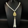 Elegant European & American Light Luxury Tassel Pearl Sweater Chain with 3D Hollow Zircon Pendant