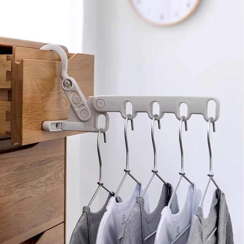 Portable Five-Hole Folding Clothes Hanger for Travel, Dormitory, Hotel, and Indoor Drying.