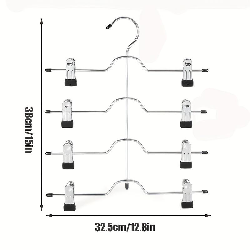 Four-layer dress hanger with 8 clips. Adjustable non-slip hanger. Made of stainless steel. Foldable for drying clothes.