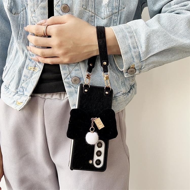 Applicable to Samsung ZFlip6 folding plush bow mobile phone case zflip5/4 portable lanyard anti-drop protective case