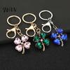 Blue Rhinestone Keychain Pendant Sparkling Rhinestones Four-Leaf Clover Design Key Chain with Electroplated Lobster Clasp Easy to Hang Holder Backpack