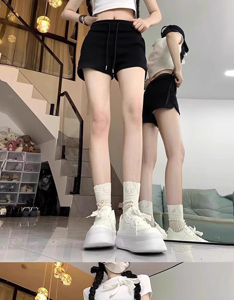 Women's Spicy Girl Black Drawstring Casual Shorts: Autumn Elastic Waist, Slit Straight Leg, Solid Color Fashion.