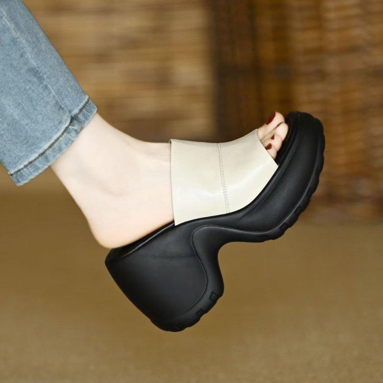

Summer small 10cm slope heel slippers women commuter thick bottom one-word drag wear leather waterproof table high heel sandals 39