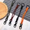 Handgefertigtes Lanyard Outdoor-Felsklettern Paracord Schlangenknoten Schlüsselanhänger Taktisches Überlebenswerkzeug Rucksack Doppelschnalle Schlüsselanhänger