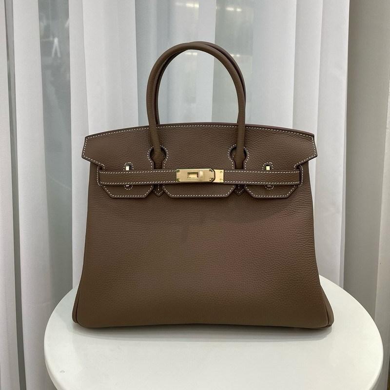 Nowy wzór Togo, skóra bydlęca pierwszej warstwy, wysokiej jakości przenośna torba listonoszka damska, duża pojemność