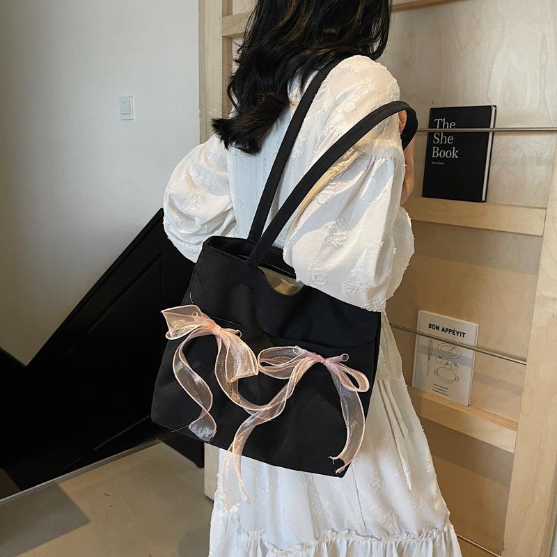 Korean version of fashionable large-capacity underarm commuter bag women's bag 2025 new bow tote bag shoulder bag