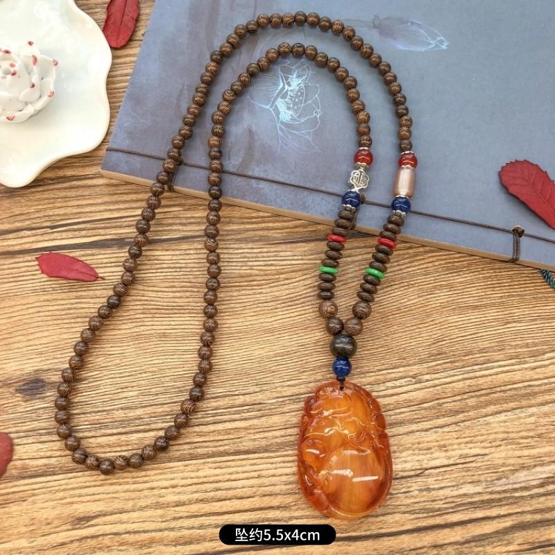 Retro chicken wing wood second generation old beeswax necklace men and women versatile amber pendant long sweater chain pendant