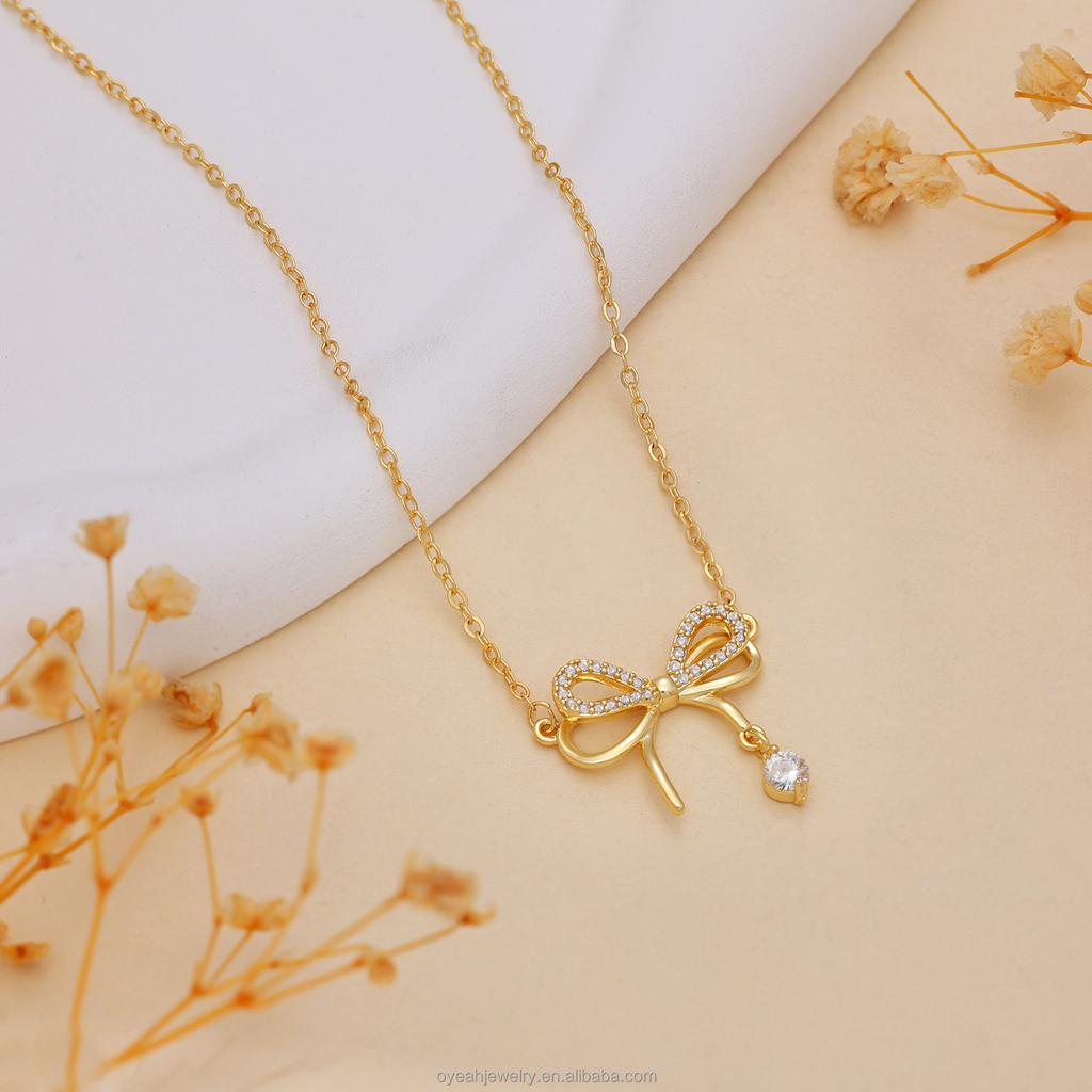 Glossy Bow Zircon Pendant Necklace with Brass Gold Tone Chain for Women