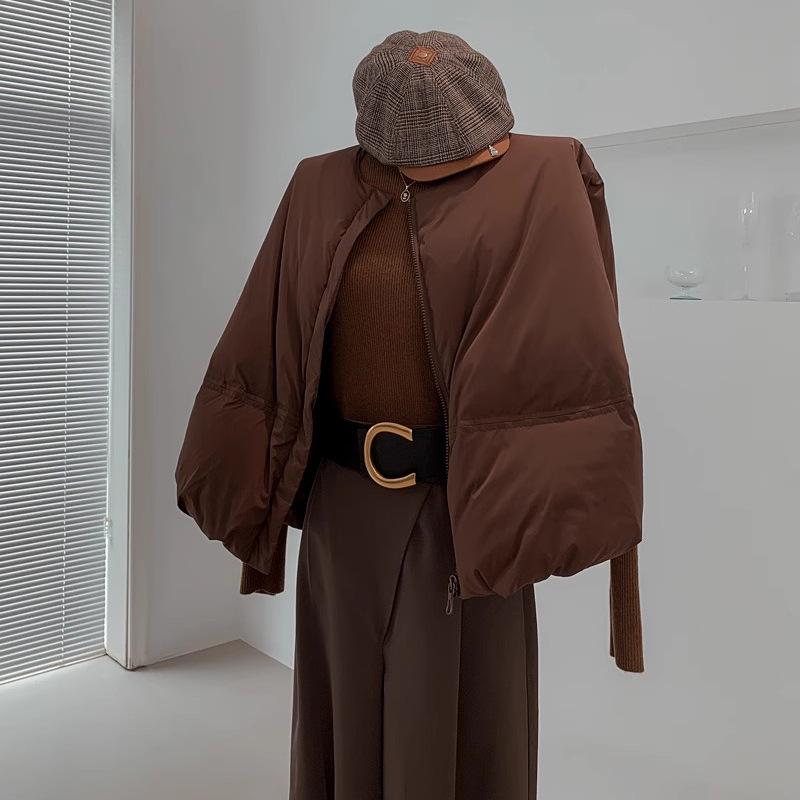 

Loose down vest women s 2025 winter new fashion round neck silhouette warm sleeveless pumpkin vest tide one size fits all коричневий